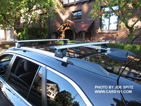 2017 Subaru Outback Touring low profile silver roof rails with optional Thule 460 system aero crossbars