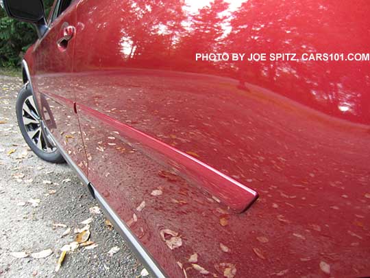 2017 Outback optional body side moldings. Venetian red color shown