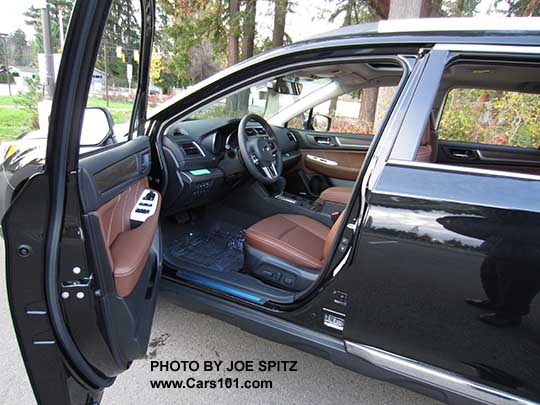 Crystal Black 2017 Subaru Outback Touring Java Brown Leather interior with white protective plastic still on the door power window switches