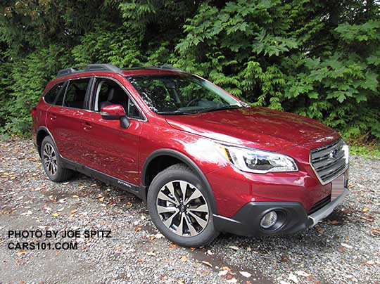 2017 Subaru Outback Limited has 18" machined black and silver wheels. Venetian red shown with optional wheel arch moldings, body side moldings, splash guards