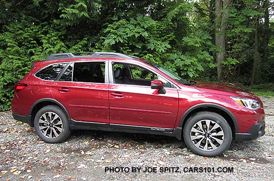 side view  2017 Subaru Outback Limited with 18" machined black and silver wheels. Venetian red shown with optional wheel arch moldings, body side moldings, splash guards