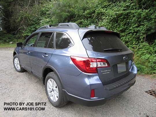 2017 Subaru Outback Premium with option side and wheel arch moldings, and rear bumper cover. Twilight blue color shown