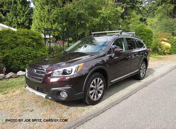 2017 Subaru Outback Touring. Brilliant Brown Pearl color shown. silver low profile roof rails, chrome rocker panel trim, machined black/gray 18" alloys, gray front grill. Optional Thule cross bars, wheel arch and side moldings, splash guards