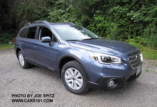 2017 Subaru Outback Premium with option side and wheel arch moldings, and rear bumper cover. Twilight blue color shown