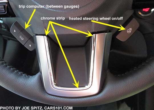 diagrammed closeup. The 2017 Subaru Outback Touring steering wheel has a thin chrome trim strip on the center spoke, and a heated steering wheel on/off button.