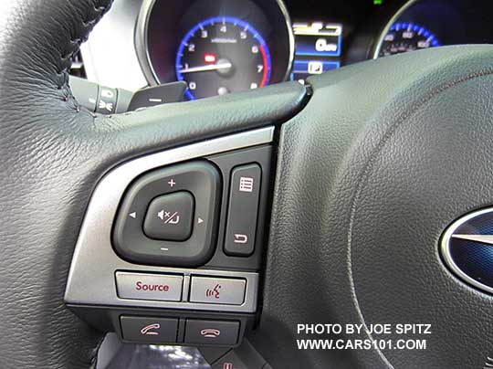 closeup of the Premium and Limited steering wheel's silver and gray finger tip buttons. Left side audio and cell phone bluetooth control buttons shown