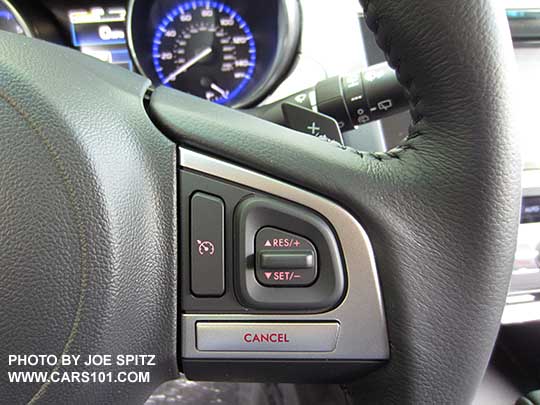 closeup of the 2017 Premium and Limited leather wrapped steering wheel has silver and gray fingertip controls. Right side cruise control shown.