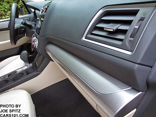 closeup of the 2017 Subaru Outback 2.5i and Premium textured silver dash and door trim.