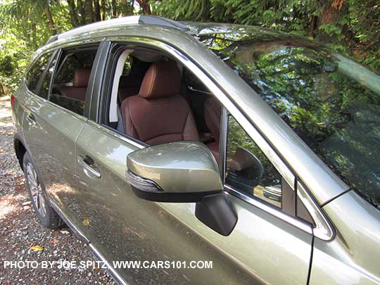 2017 Subaru Outback Touring chrome window trim, wilderness green color shown