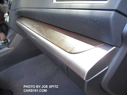 closeup of the 2017 Subaru Outback Touring dash and door trim- metallic and wood grained
