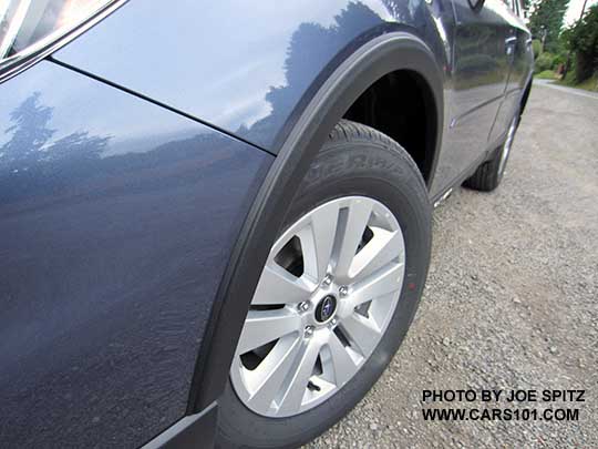 2017 Subaru Outback optional wheel arch moldings on a Twilight blue 2.5i or Premium model