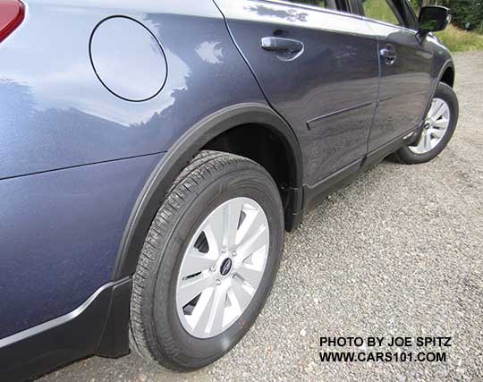 2017 Outback optional wheel arch moldings, body side moldings, and splash guards on a 2.5i and Premium with silver 17" alloys. Twilight blue color shown