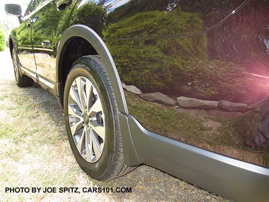 Brilliant Brown Pearl color 2017 Subaru Outback Touring with optional splash guards, wheel arch moldings, and body side moldings