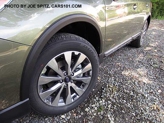 Wilderness green color 2017 Subaru Outback Touring with optional wheel arch moldings