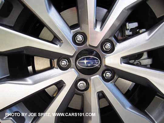 closeup of the 2017 Outback Touring 18" 10 spoke machine finish silver and gray alloy wheels