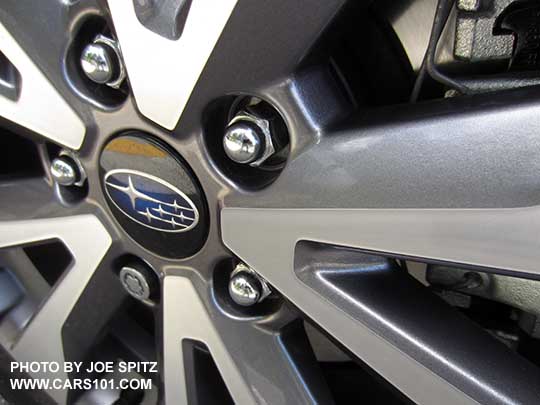 closeup of the 2017 Outback Touring 18" 10 spoke machine finish silver and gray alloy wheels