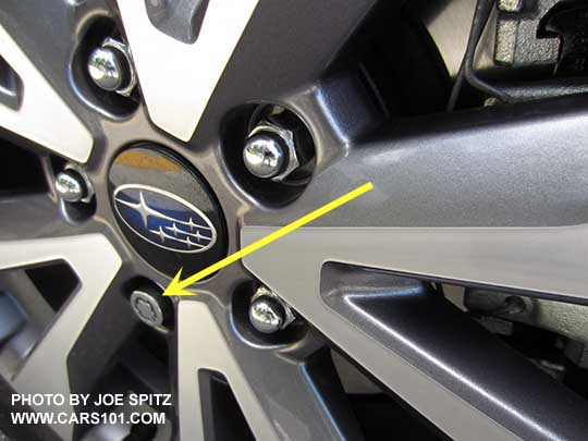 closeup of the 2017 Outback wheel with optional alloy wheel lock. Touring model silver and gray wheel shown