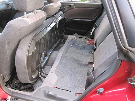 subaru outback rear seat cushion flips forward,