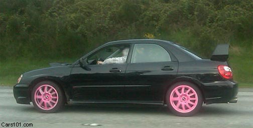 black 2004-2007 STI seen on the highway