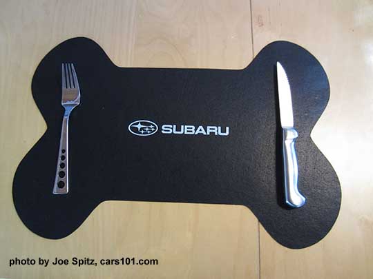 Subaru dog place mat (shown with a human fork and knife).