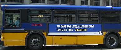 Subaru ad on the side of a Seattle bus, June 2006