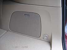 HK audio, rear cargo area speaker, ivory interior shown