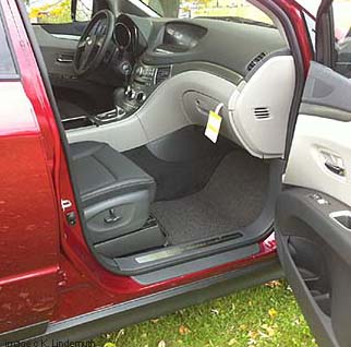 new for 2011- Ruby Red Subaru Tribeca now has slate gray interior