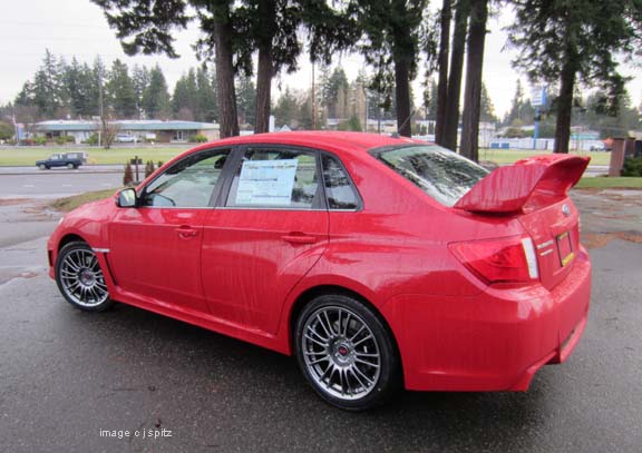 spiler on 2012 STI 4 door sedan limited. red