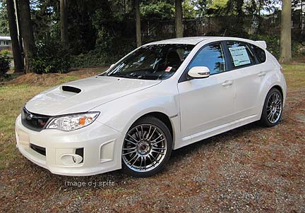 3/4 view white sti 5 door, 2012