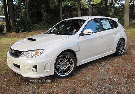 3/4 view white sti 5 door, 2012