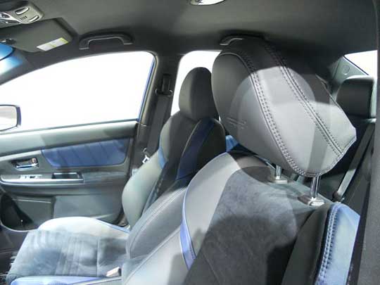 2015 STI front headrest has tilt  and height adjustment