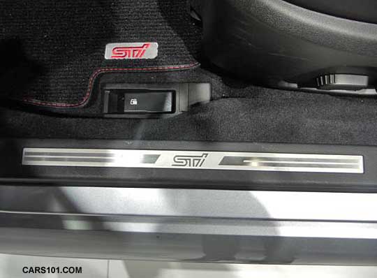 2015 STI Limited front door jam showing power seat, metal sill plate
