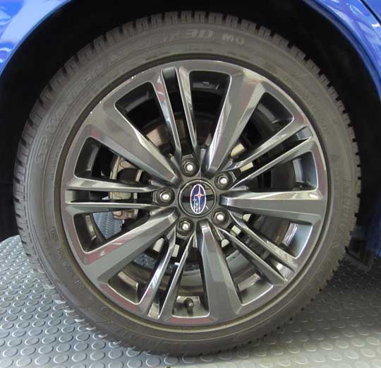 2015 wrx limited standard gray 17" alloy wheel, shown with aftermarket all season tires