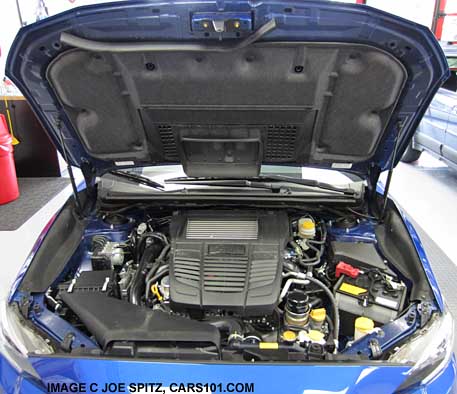 2015 wrx engine and hood showing hood struts, underhood cover, engine cover
