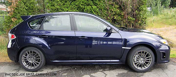 2013 subaru wrx 5 door wagon hatchback, side view, color is plasma blue
