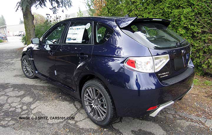 2013 subaru wrx 5 door with optional exhuast tip finishers, plasma blue silica color shown