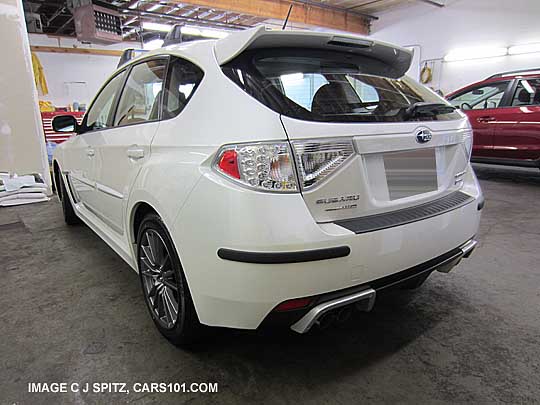 2013 wrx 5 door wit optional rear bumper cover, exhuast tip finishers, dealer installed corner moldings