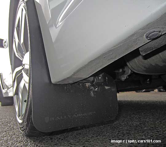 aftermarket Rally Armor mud flaps on a 2013 Subaru STI