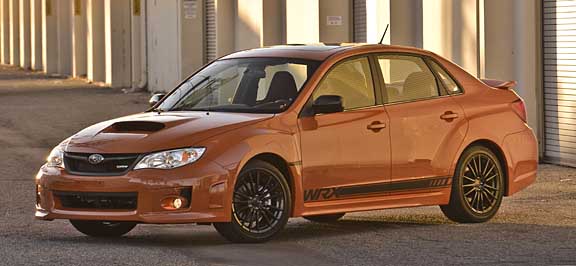 tangerine orange subaru 2013 wrx side view. 200 cars available sping 2013
