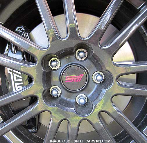 closeup of 2013 sti special edition se black alloy wheel