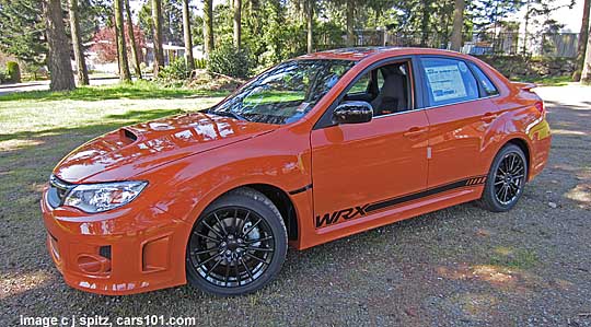side view 2013 wrx special edition 4 door tangerine orange sedan