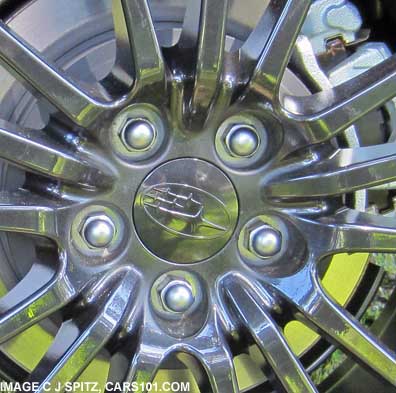 closeup of 2013 subaru impreza wrx special edition black alloy wheel center cap
