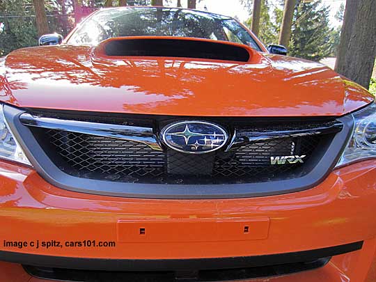 closeup of front grill 2013 wrx special edition orange color sedan