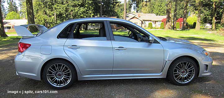 side view 2013 subaru sti 4 door sedan, ice silver shown