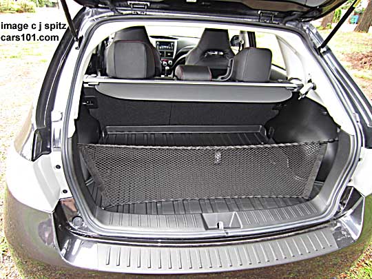 2014 wrx sti cargo area showing cargo cover, tray, net, rear bumper cover