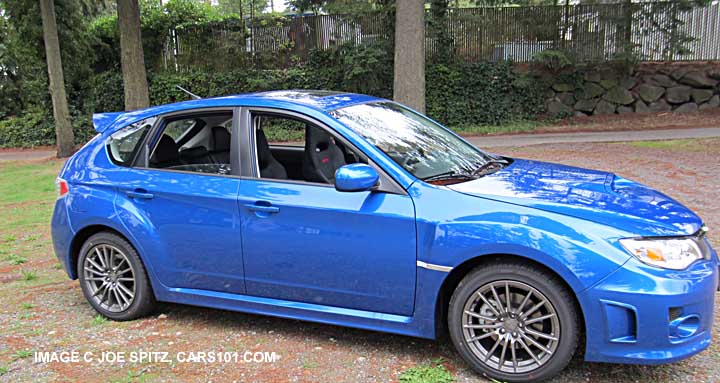 side view 2014 subaru impreza wrx 5door wagon, world rally blue color