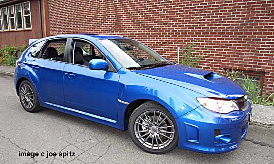 side view worl rally blue wrx 5 door wagon hatchback