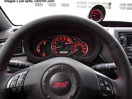 2014 STI steering wheel, shown with optionale turbo boost gauge