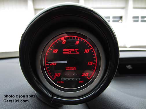 closeup of the 2014 Subaru WRX and STI optional turbo book gauge