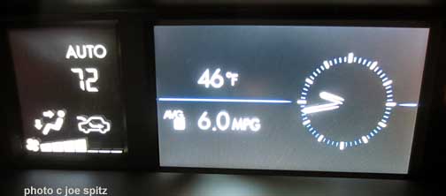 upper console display showing clock, outside temp, average MPG,